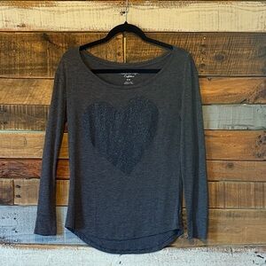 American Eagle Outfitters long-sleeve t-shirt featuring a sparkle heart design